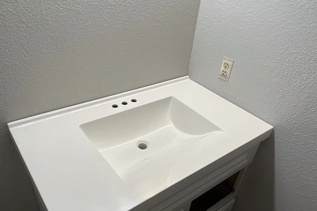 Vanity top set and ready for the plumber to reconnect