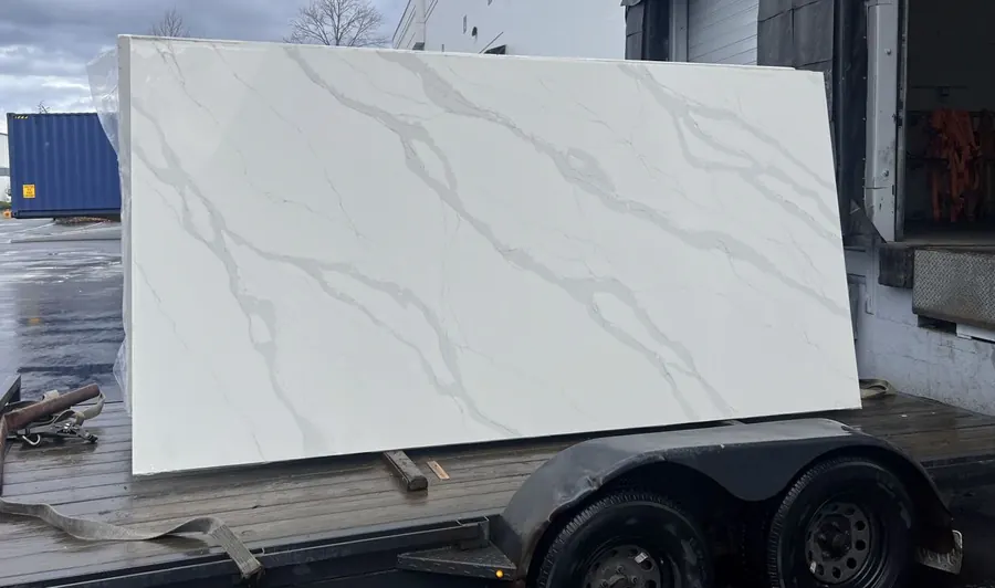 A finished quartz slab loaded on a trailer outside the StoneWay fabrication shop in Kent, WA